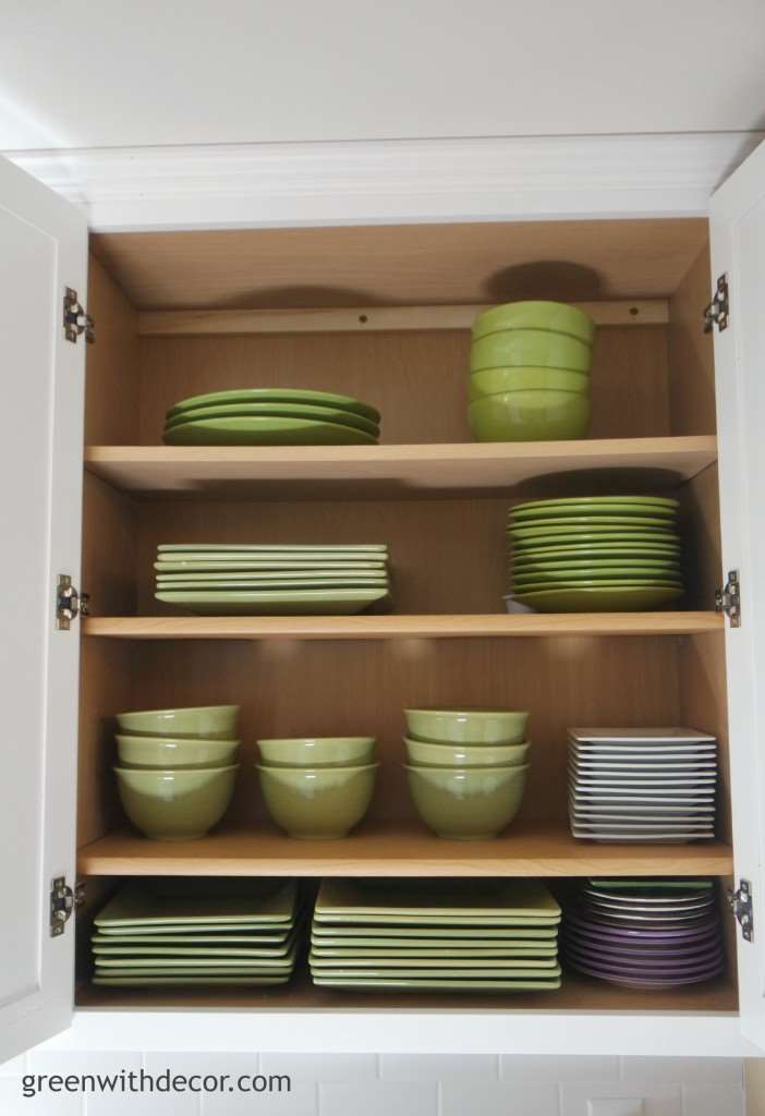 Add extra storage in the kitchen cabinets with this easy trick! | Green With Decor 