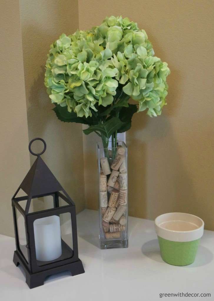 Spray paint a flowerpot for an updated look. She took the flowerpot that came with a flower arrangement and gave it a new look! Fun idea with Rustoleum spray paint