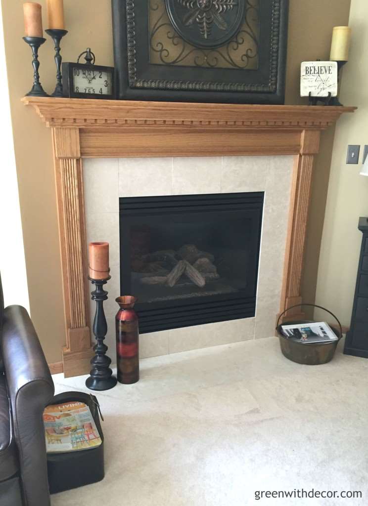 Update the look of a fireplace for less than $10. This is such a great idea! | Green With Decor