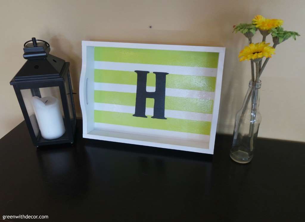 What a fun DIY tray project! How to add an initial and stripes to a plain wooden tray. Love the green and white stripes! Fun idea with Rustoleum spray paint