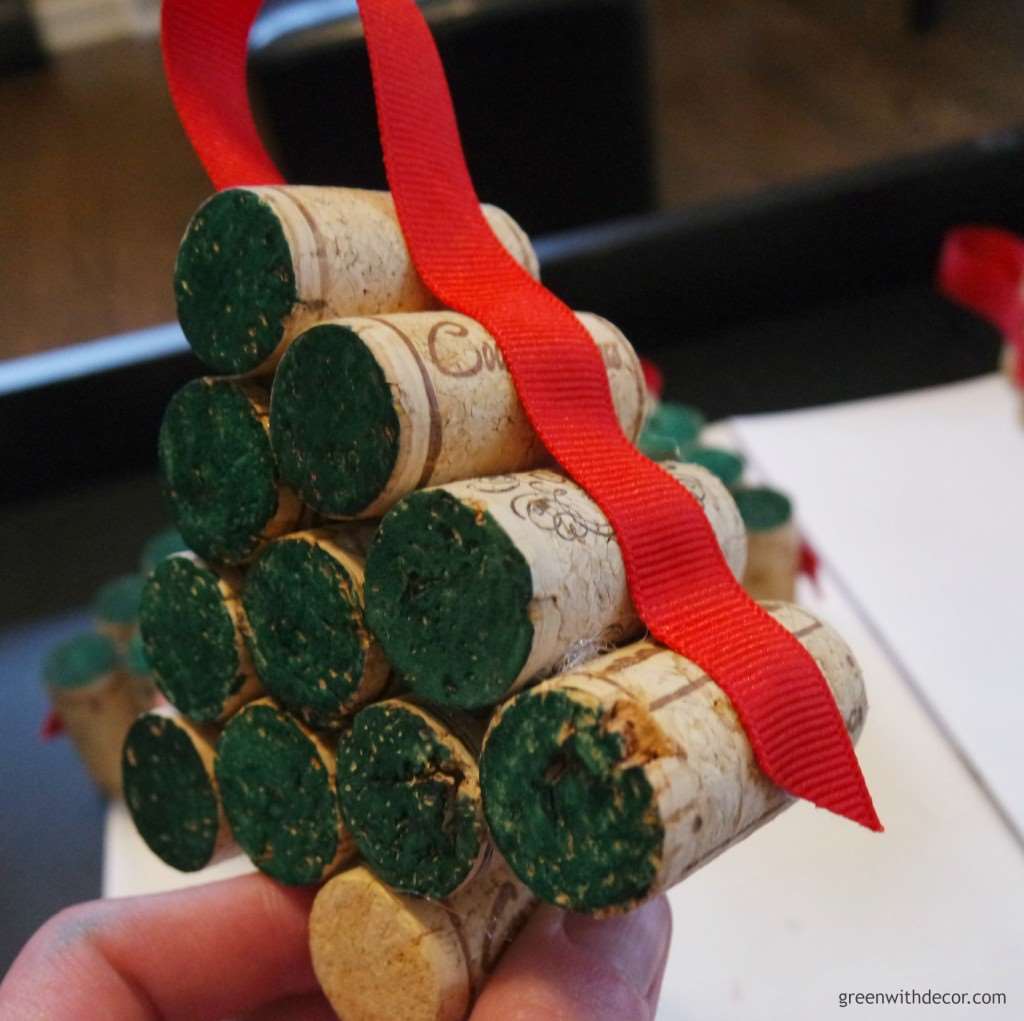 Red ribbon affixed to the wine corks shaped like a tree