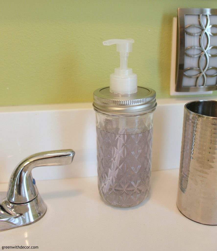 Easy Mason jar soap dispensers – what a fun way to add a farmhouse look to the bathroom! | Green With Decor