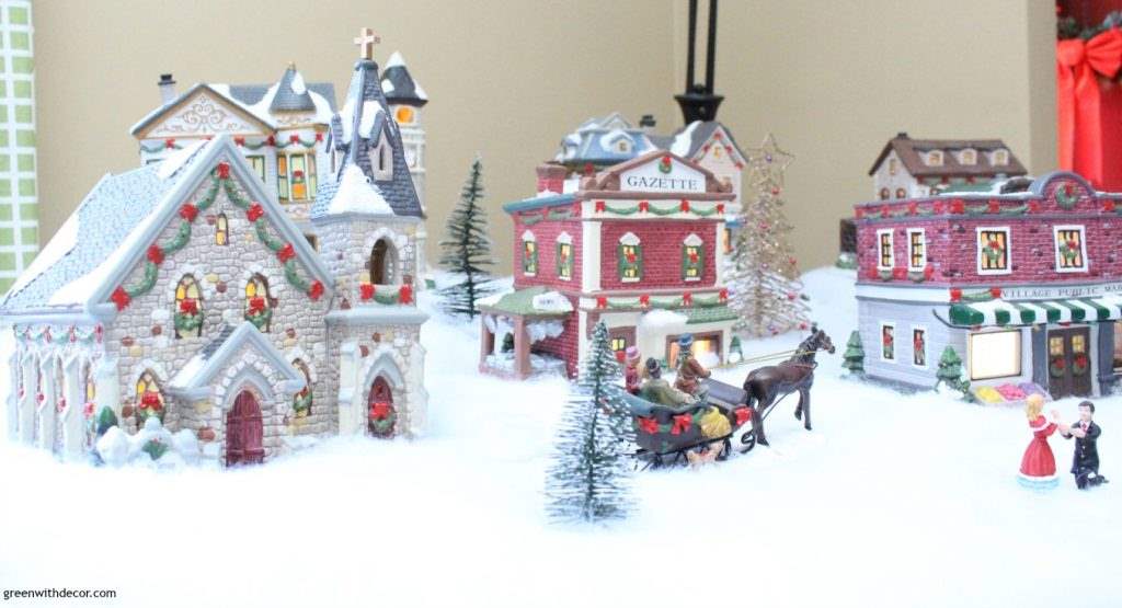 This blogger has such a great Christmas village. I love how she adds sentimental pieces each year and always on a budget. She even found a village piece at Goodwill – love her ideas!