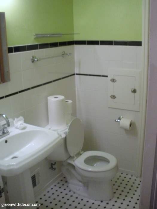 bathroom white black tile with lime green walls