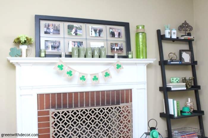 St. Patrick's Day decorations sit atop a fireplace mantle next to a ladder shelf.