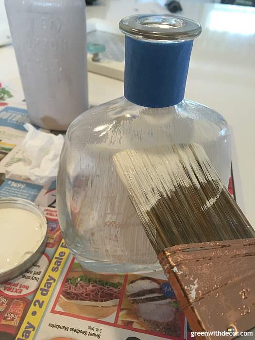 An easy way to DIY faux concrete vases | diy project | diy vase | spring project | how to use clay paint | use old glass bottles | liquor bottle diy | diy bottle project | painting diy