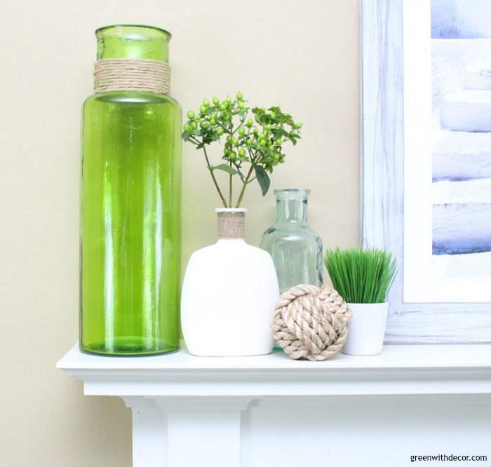 5 pieces to use for a beachy summer mantel | What to use for a summer mantel | Love the beachy picture frames with the colored glass vases and rope sphere | summer decorating ideas for the mantel | coastal summer decor | mantel decorating ideas