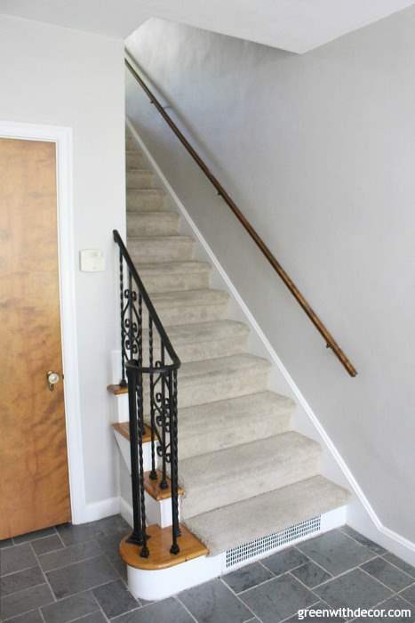 Gorgeous shade of gray: Agreeable Gray by Sherwin Williams. This foyer has so much old charm, the gray paint brightens it right up!