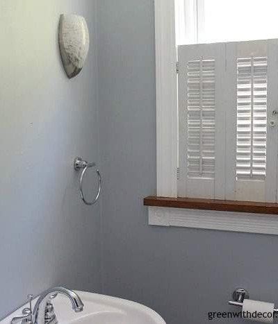 Krypton blue painted bathroom. Love this color! It's the perfect blue paint color with just a hint of gray. Beautiful with white woodwork.