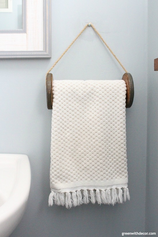 A list of the 10 best pieces to buy at the thrift store - spool turned DIY towel rack
