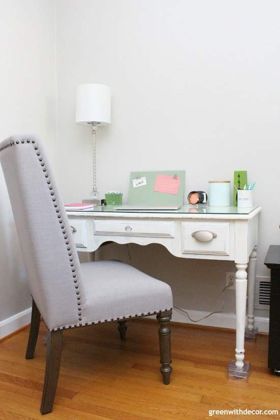 How to set up a home office you're comfortable in, even when you don't have an extra room. Plus a good tip for making a desk a few inches taller! How cute is that chair, it looks so comfy!