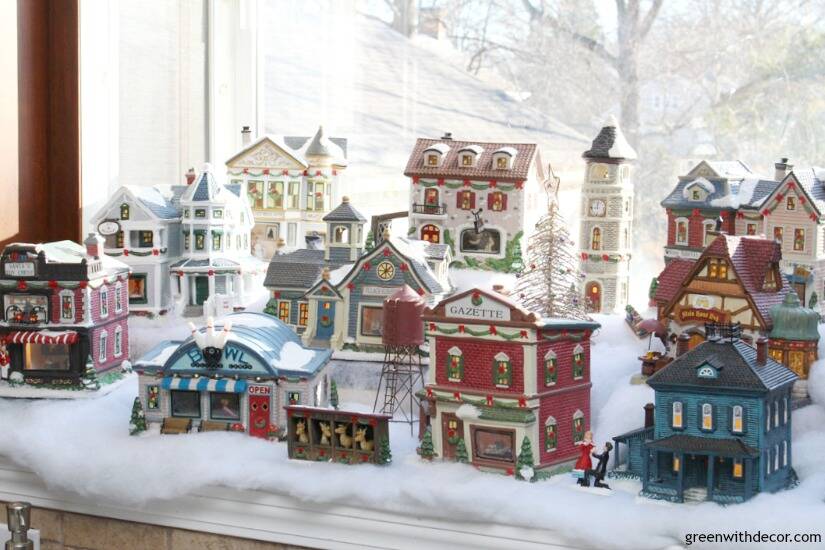 Christmas decorating in a big window box - perfect space for a cute Christmas village!