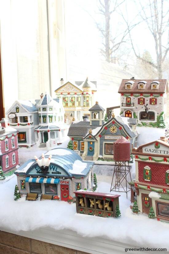 Christmas decorating in a big window box - great space for a cute Christmas village!