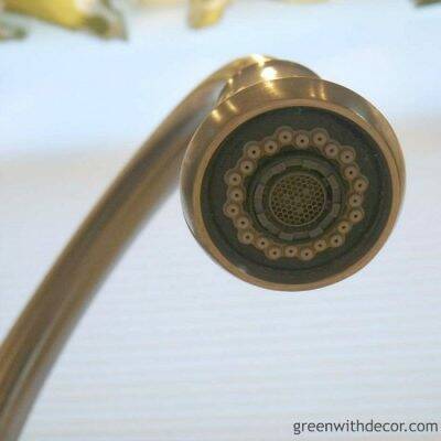 The easiest way to clean the bottom of the kitchen faucet