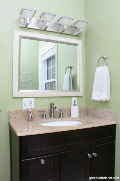 Easy ways to update a bathroom without renovating - if you can't afford a bathroom remodel or are renting, these are great tips for updating your bathroom! New vanity hardware is a small update that can make a big difference in a bathroom.
