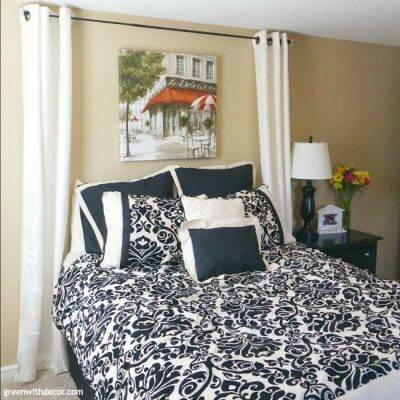 I love this guest room. What a pretty headboard idea!
