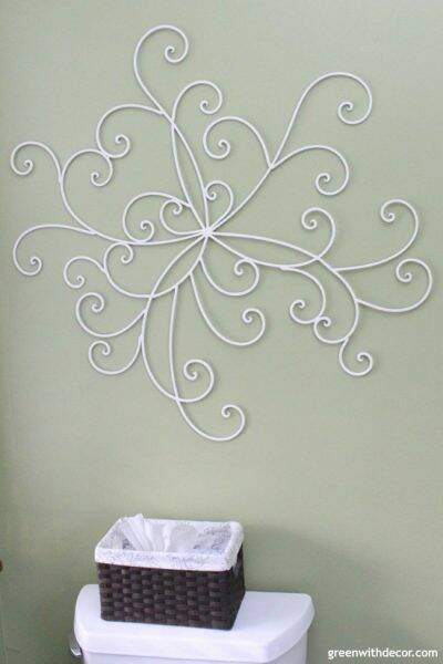 The easiest way to update metal wall decor - give it a coat of paint and move it to a new room for a new look! Such an easy decorating and DIY idea!