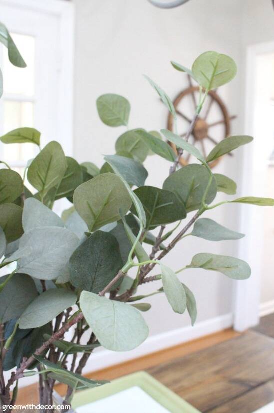 How pretty is this faux eucalyptus?! So perfect for an easy green and blue spring tablescape - you could really use this year round as a centerpiece!