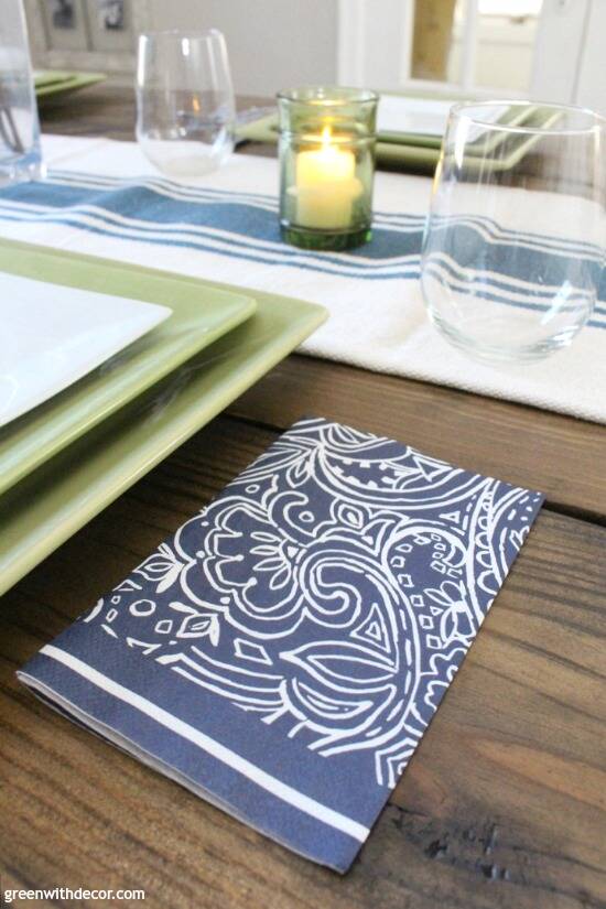 Use pretty paper napkins for an elegant touch with easy cleanup! So cute for a green and blue spring tablescape!
