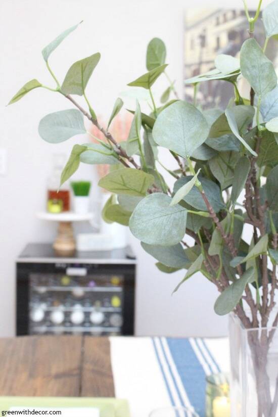 How pretty is this faux eucalyptus?! So perfect for an easy green and blue spring tablescape - you could use it year round as a centerpiece!