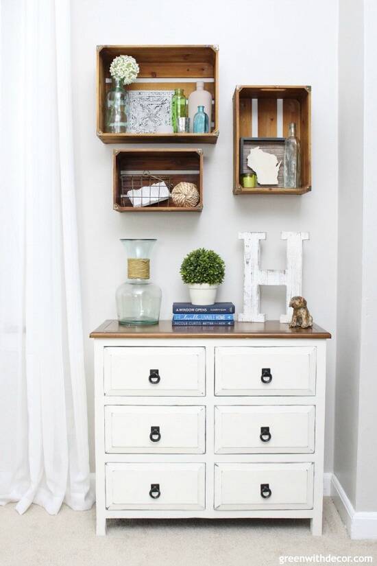 Pretty spring decorating ideas. Love this white chest with the wood crates as wall shelves!