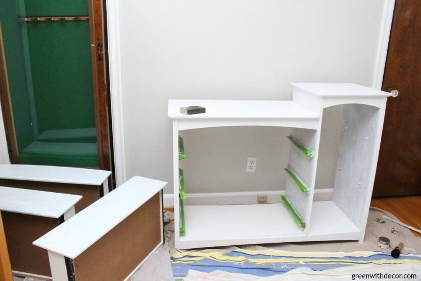 Old dresser with a coat of primer on it