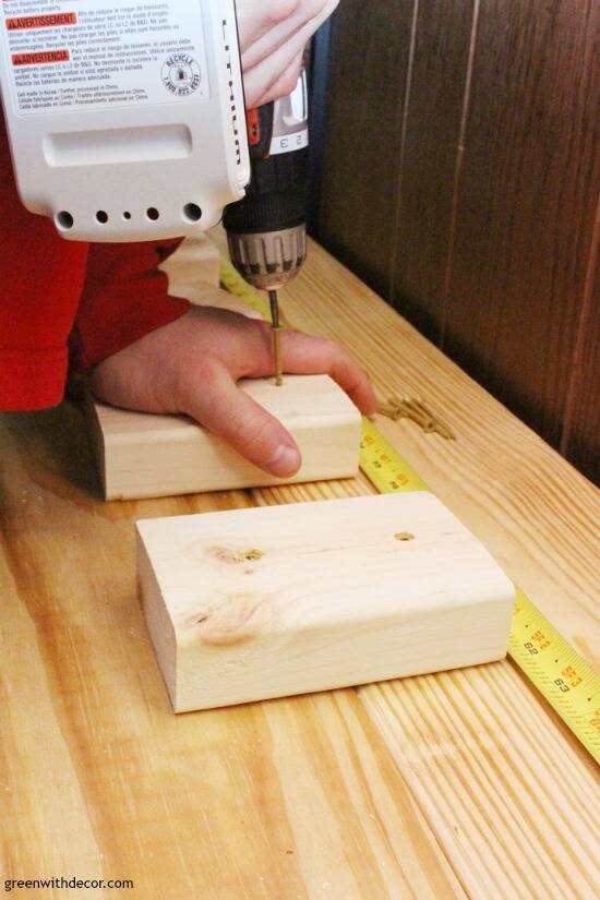 Drilling support boards into the bottom of a DIY bench top