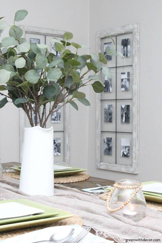 DIY wall decor: Windows turned picture frames near faux eucalyptus