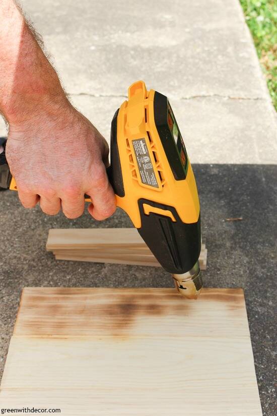 Use a heat gun to get a burned wood finish for DIY picture frames