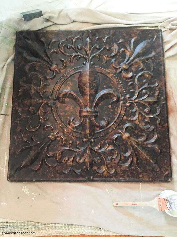 Bronze metal piece before it’s painted for a DIY wall art project