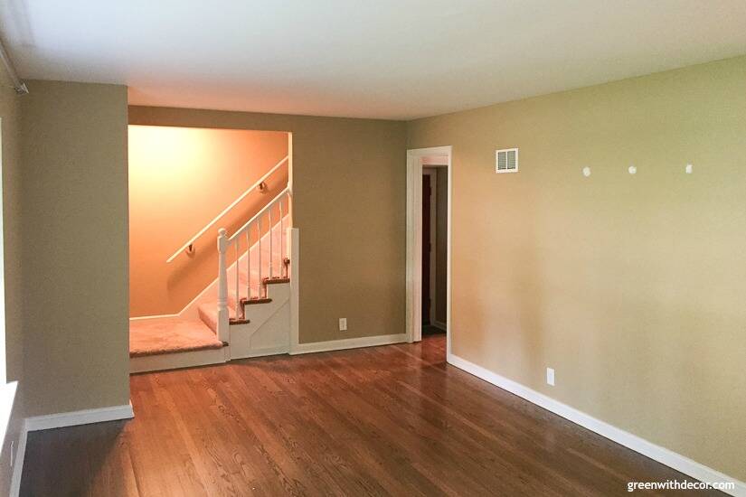 Tan living room with stairs