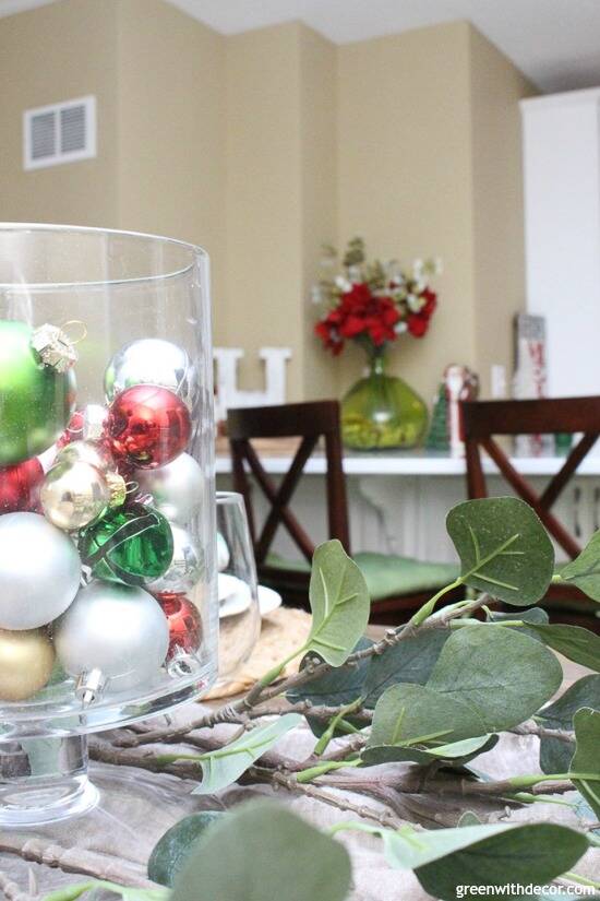 A Christmas Centerpiece With Eucalyptus Ornaments Green With Decor