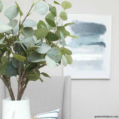 Faux eucalyptus in a gray dining room