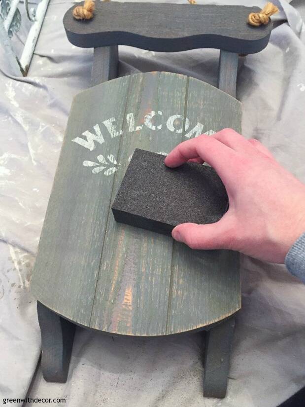 Blue wood sled and sanding sponge