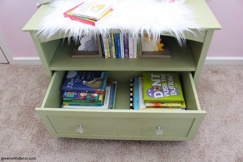 An old TV stand turned nursery book storage - Green With Decor