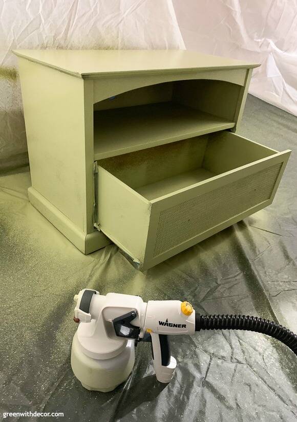 An old TV stand turned nursery book storage - Green With Decor