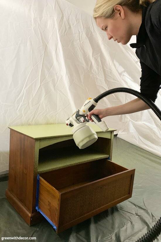 An old TV stand turned nursery book storage - Green With Decor