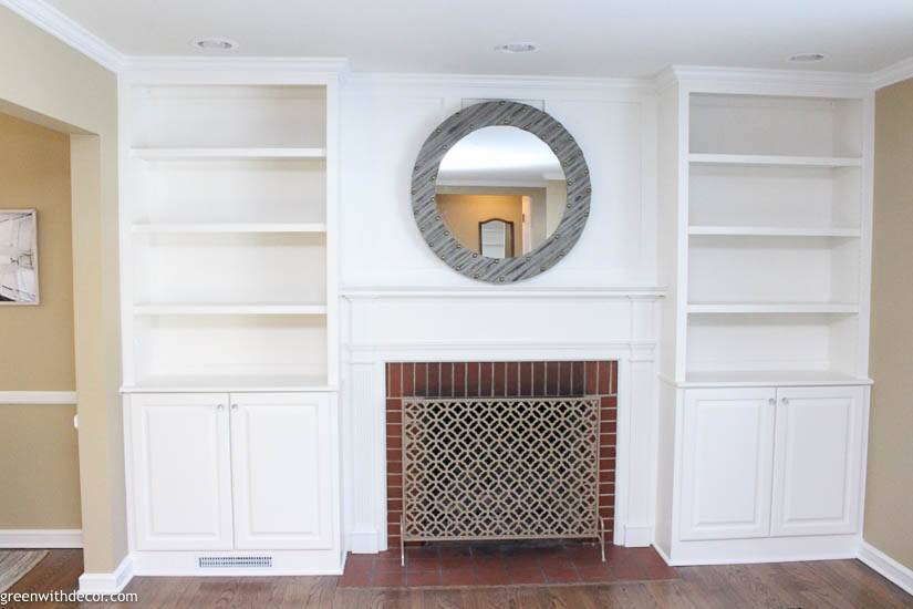 White Built In Bookshelves Around The Fireplace Green With Decor