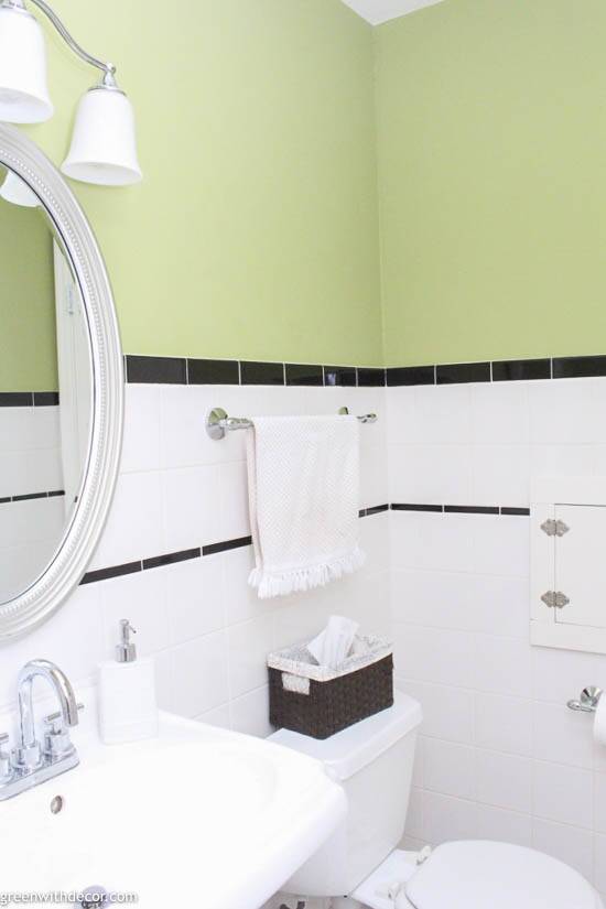 Green, white and black classic powder room
