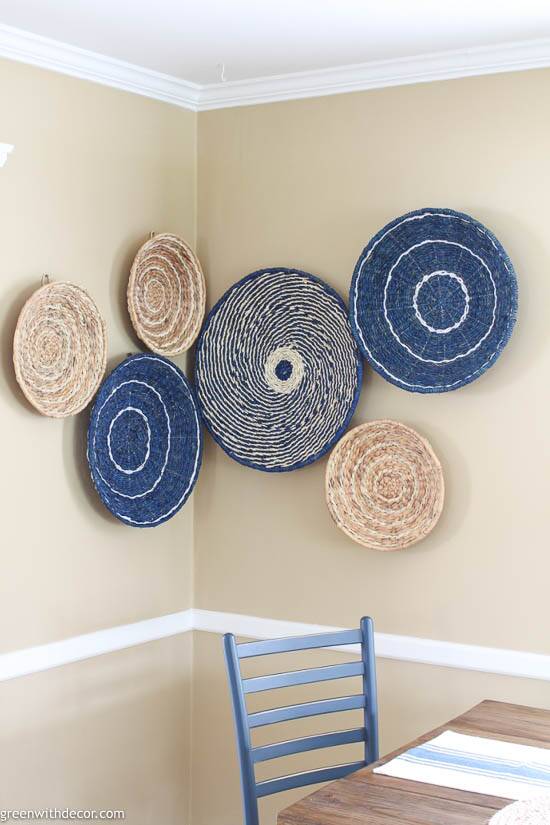 Navy, white and tan seagrass basket gallery wall wrapped around a corner