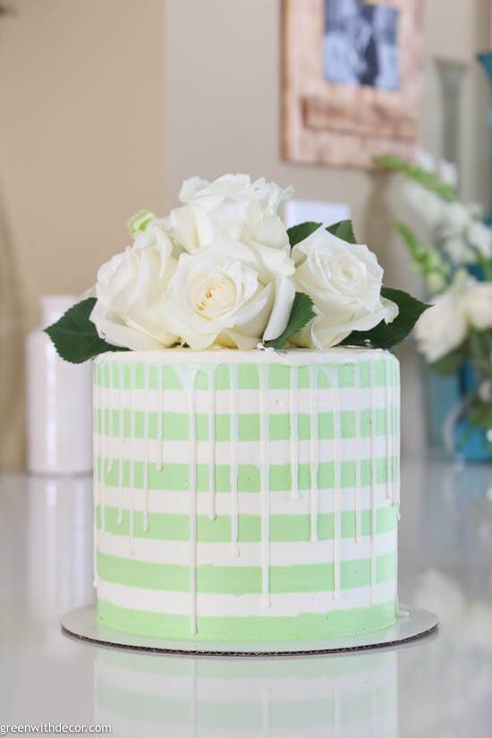 Green and white striped cake with roses