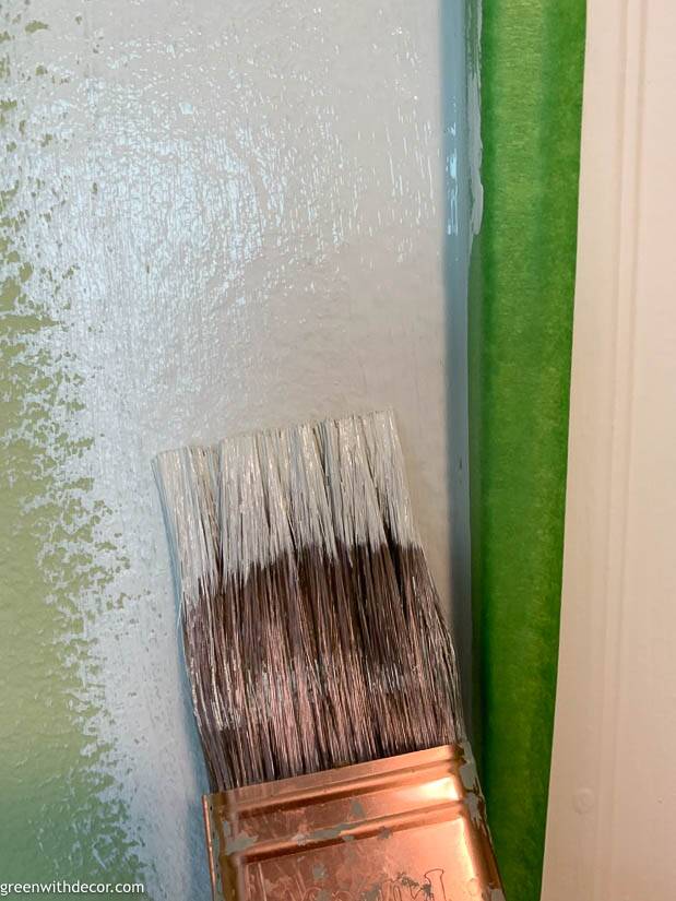 The best painters tape for clean lines next to a wet paint brush