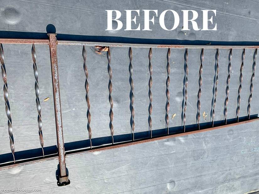An old rusty railing before fresh paint