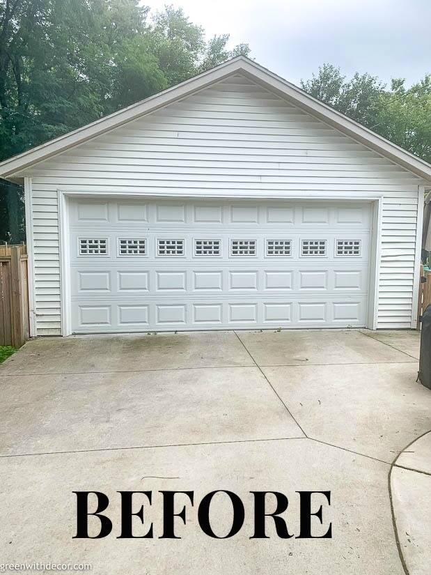 A concrete driveway before being cleaned with a pressure washer