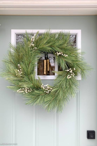 How to hang a wreath on a door, green wreath on aqua door