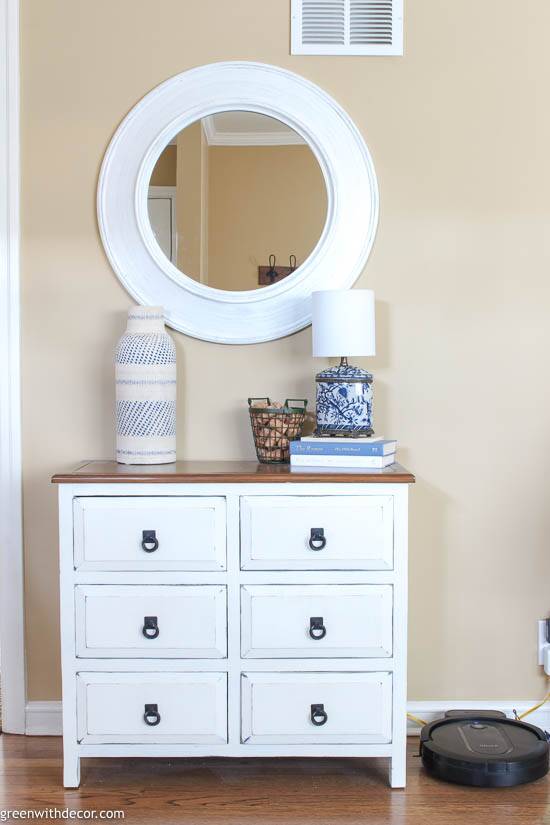 Small coastal foyer with white chippy dresser