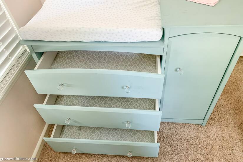 Blue dresser with pretty drawer liners