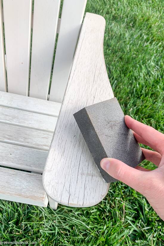 Sanding old wood chair before painting