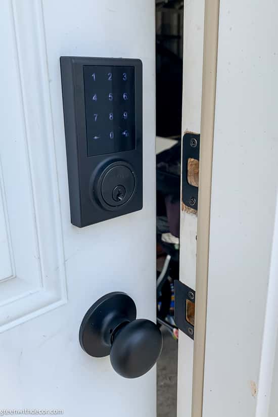 Black smart lock doorknob installed