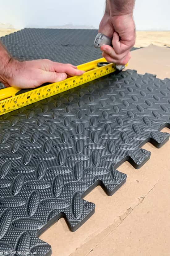 Cutting gym tile pieces for basement flooring